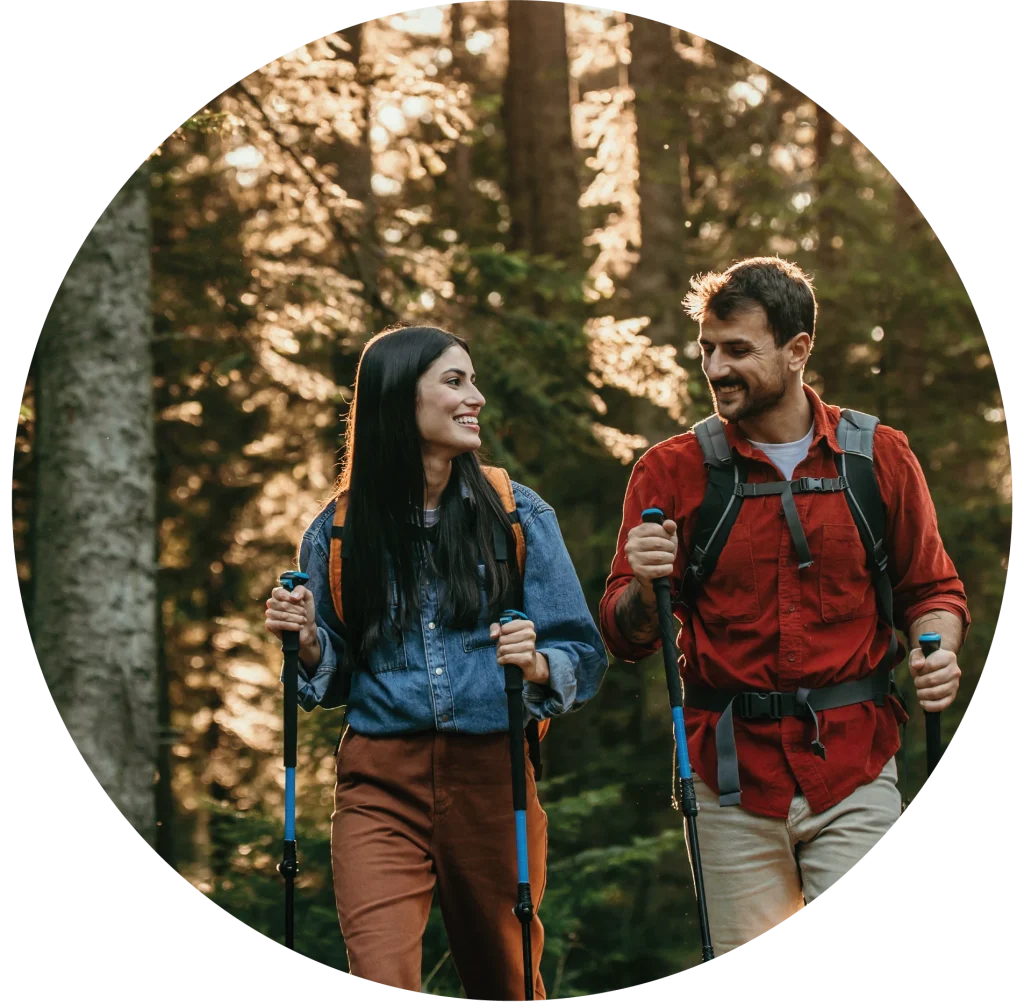 Couple hiking in woods.